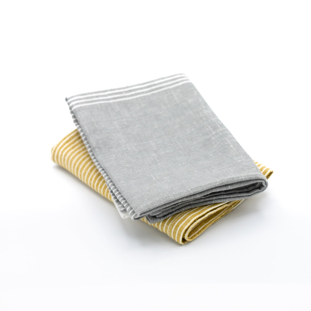 2 linen tea towels, one yellow and one grey
