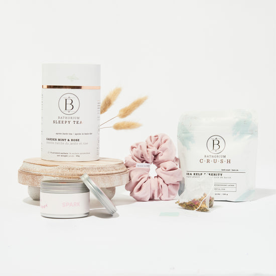 Load image into Gallery viewer, Collection of gift box items includes a candle, bath soak, hair scrunchie and sleepy tea
